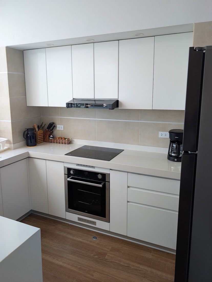 Full kitchen with oven and induction cooktop